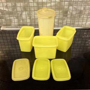Tupperware- Three yellow storage containers with one off white juice container